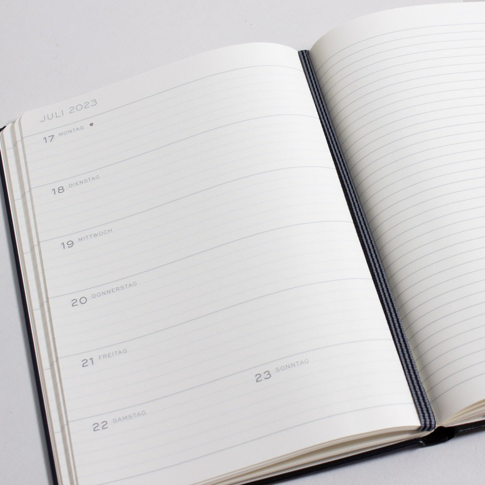 Wochenkalender und Notizbuch 2026 liniert / Hardcover